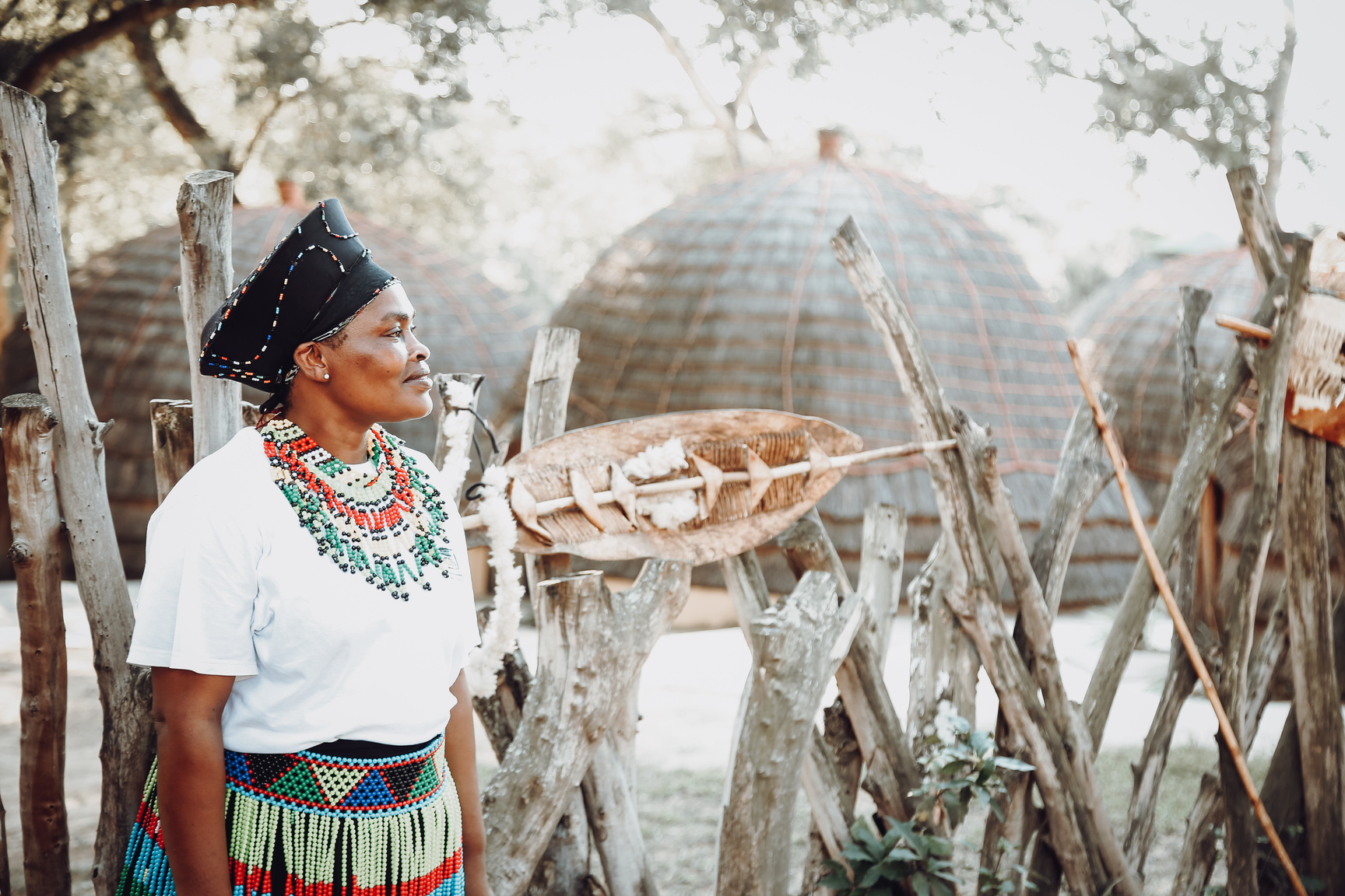 Woman in Traditional Clothing in African Village 